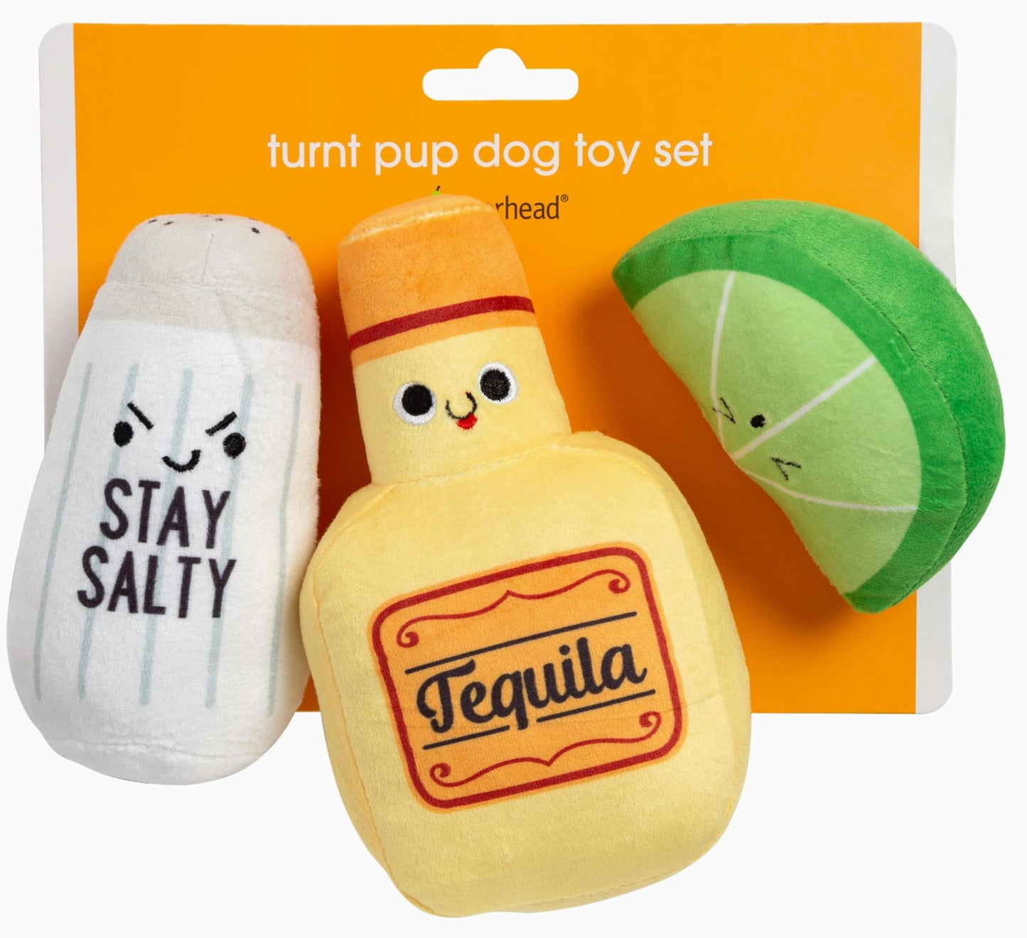 Dog toys in the shape of tequila, a lime wedge and salt shaker