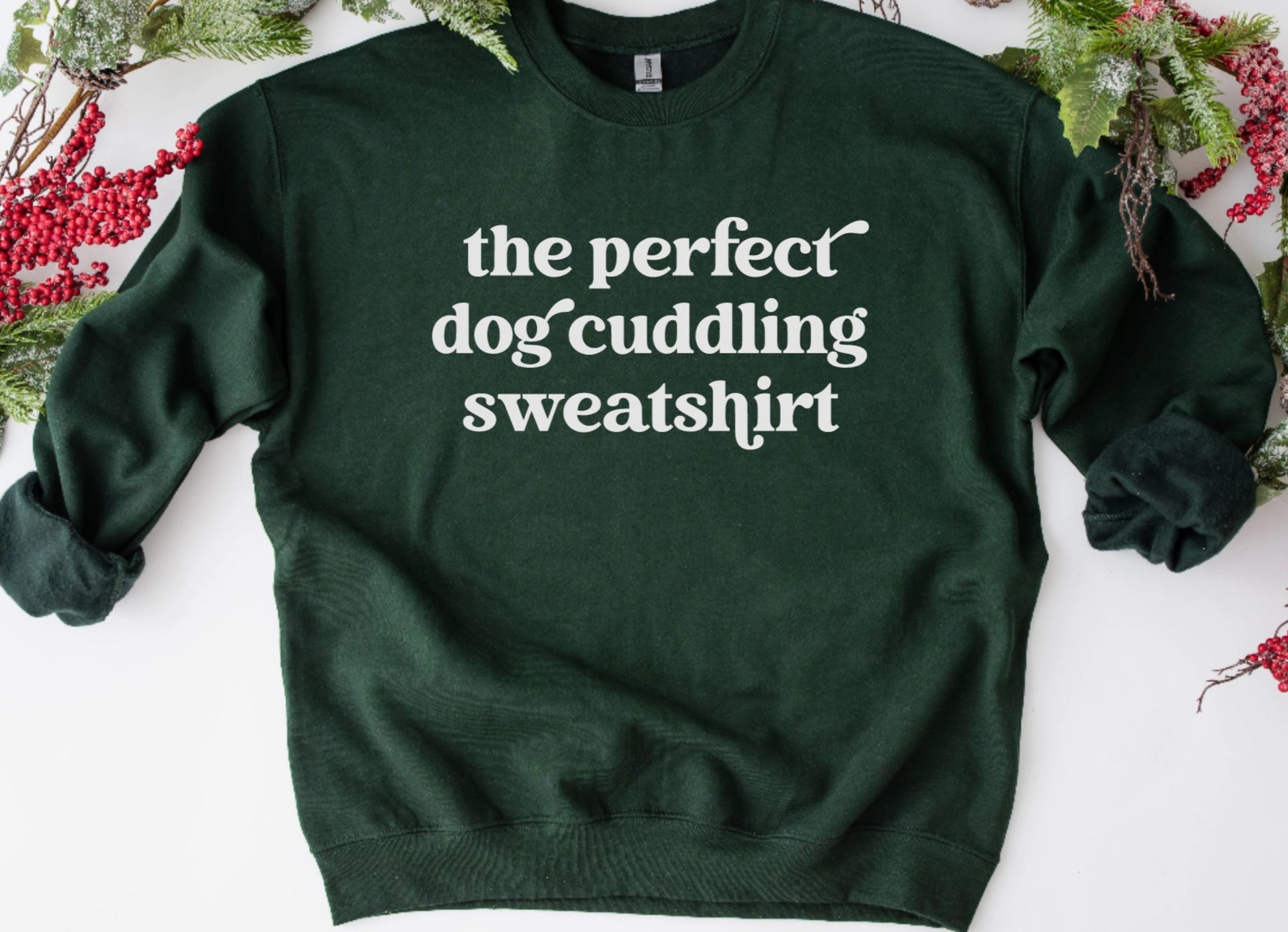 green sweatshirt that says, the perfect dog cuddling sweatshirt