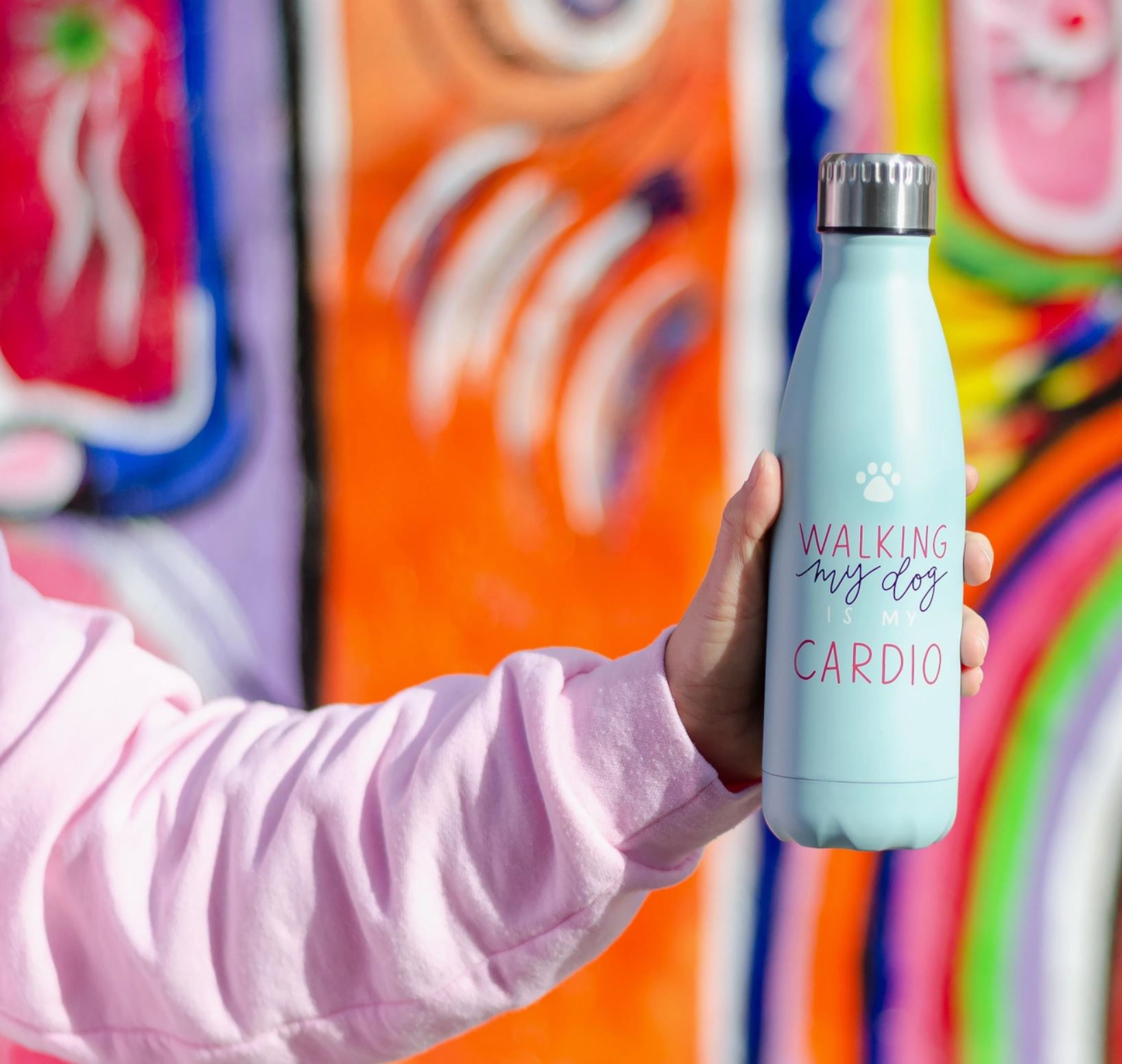 Water bottle that reads, walking my dog is my cardio