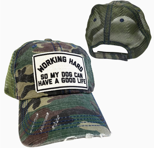 Camo hat with funny saying, working hard so my dog can have a good life